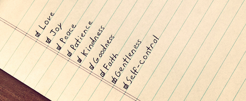 lined paper with list of patience, kindness, goodness, faith, etc.