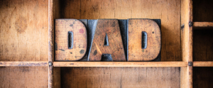 wood block letters spell dad