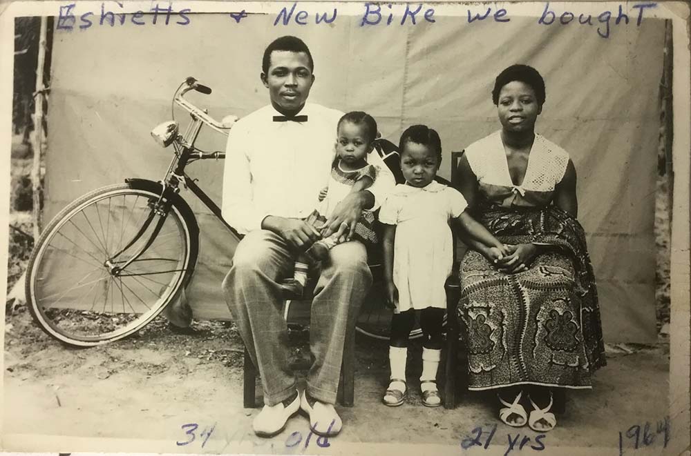Eshiett family from Nigeria in 1964 with bicycle purchased by Delores Griepentrog and friends