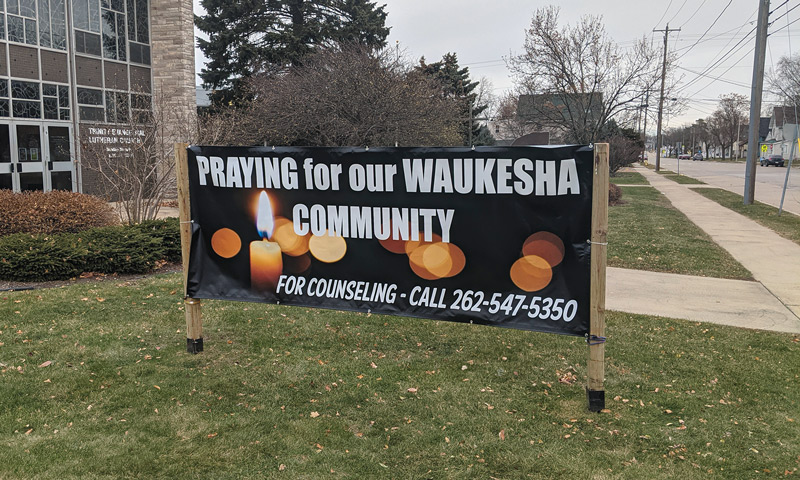 Sign in front of church: Praying for our Waukesha Community