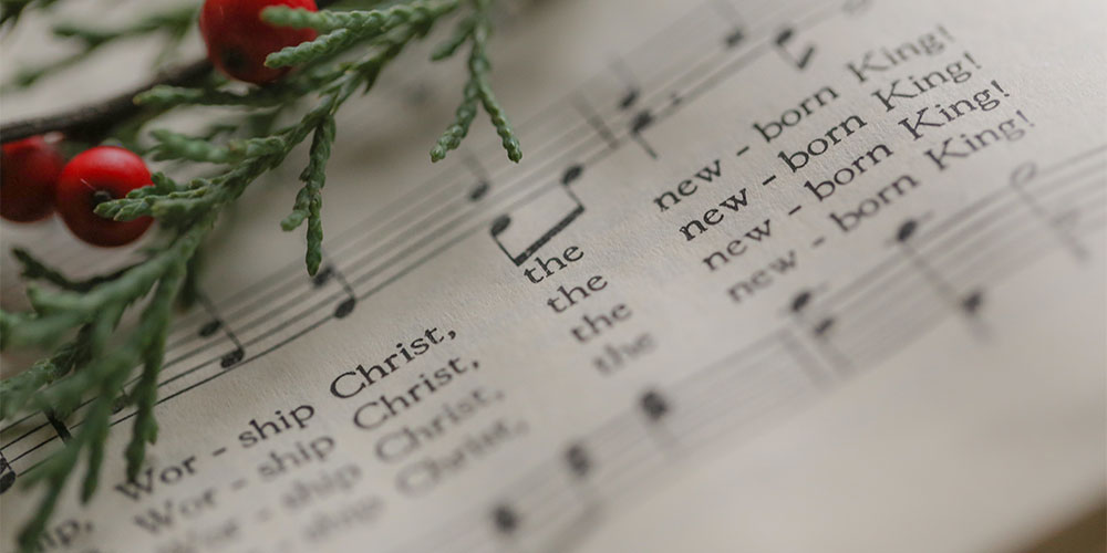 song from hymn with christmas bough and berries