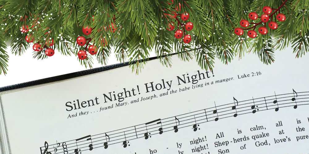 Silent night song in book and christmas garland