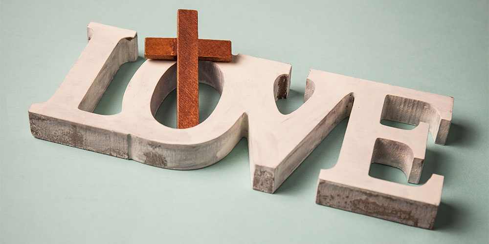 Love wood cut out with cross
