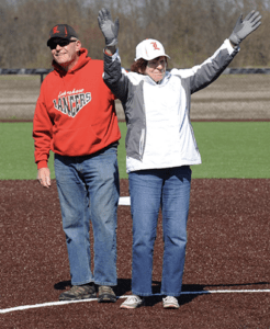 Bob and Betty Kohn on a baseball field