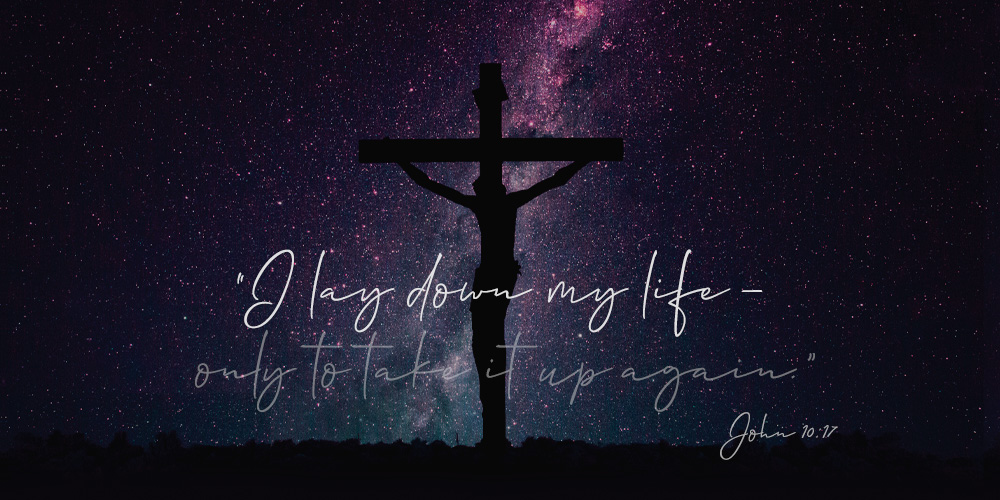 Jesus on cross with dark sky and stars