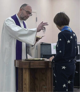 Pastor Timothy Bourman baptized Flora April 2023.