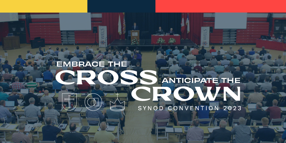 cross and crown logo and overview of the convention attendees