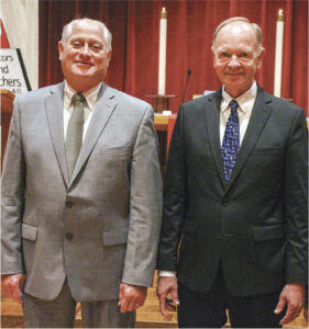 Joel Voss, second vice president, and Mark Schroeder, president