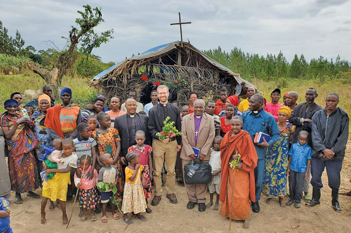 pastor in africa with many people