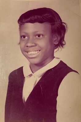 Dr. Joan Prince at age nine in a school photo as a nine-year-old attending St. Philip, Milwaukee