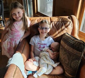 Sophie and Maggie Willems with their cousin, Parker.