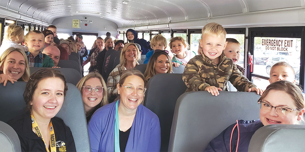 moms and children on a bus