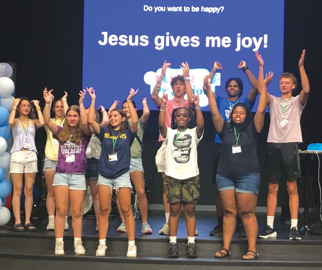 teens singing on stage