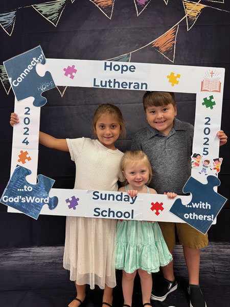 Irmo SC Sunday School children holding up a large picture frame