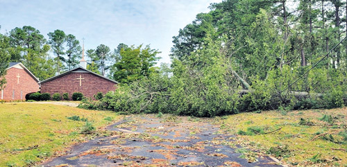 Hurricane Helene aftermath at a church trees down on driveway