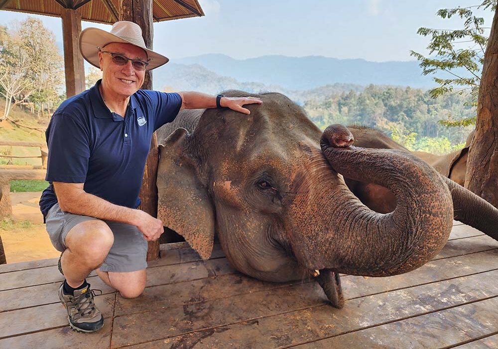 James Aderman with an elephant