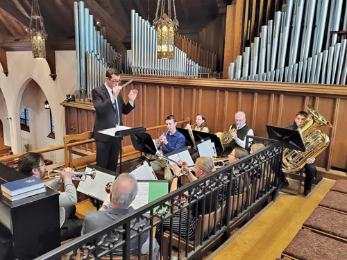 church musicians practicing in church