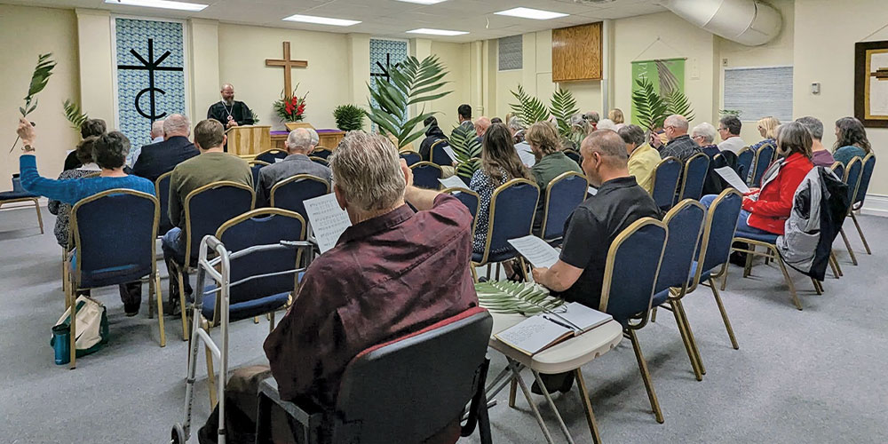 palm sunday service holding palms
