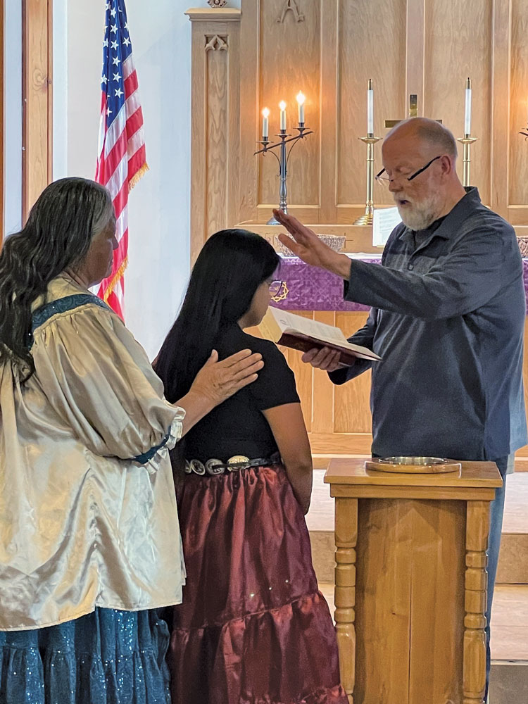 woman being baptized.