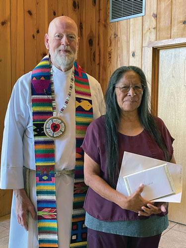 pastor with indian stole and indian woman