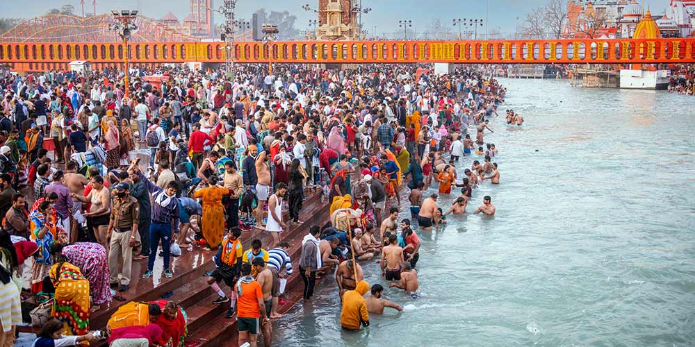 A large quantity of Indian people going into a river