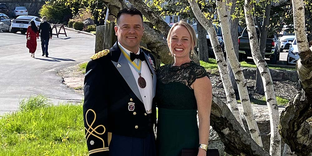 Joel and Natalie Kassulke dressed for a military event