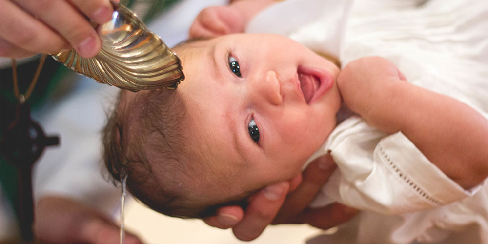 baby being baptized