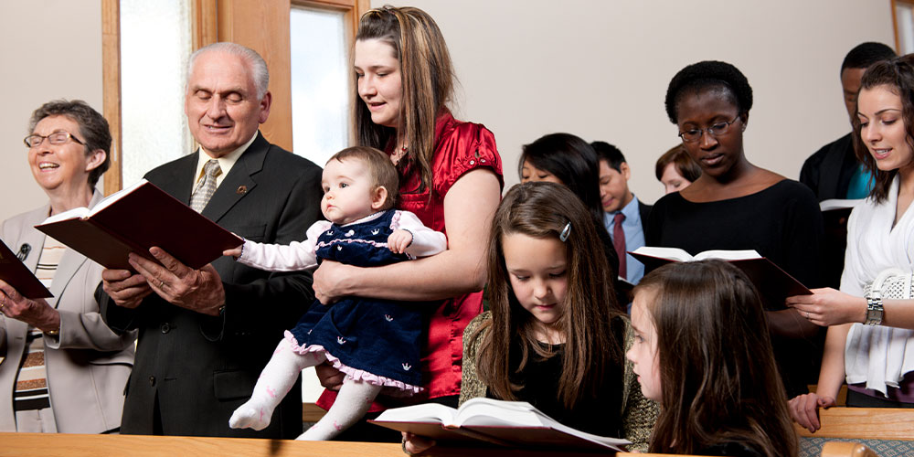 families in church singing
