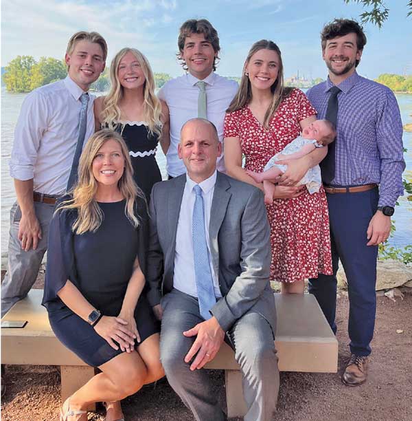 Outdoor photo of Mary Heckendorf and family