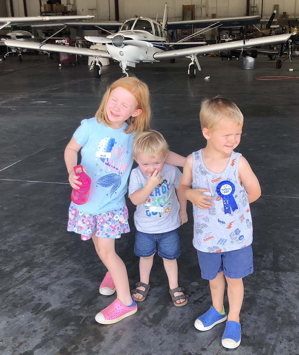 The Gilbertson kids (Millie, Teagan, Ian L-R) at the 2022 airplane-themed science camp at Living Word, Morristown, Tenn.