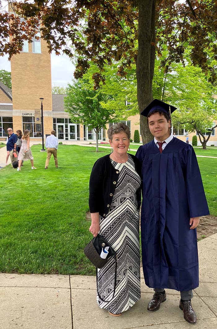 Jane Schlenvogt-Dew and Nathan Hong-Mitchell at Nathan's graduation from Luther Preparatory School