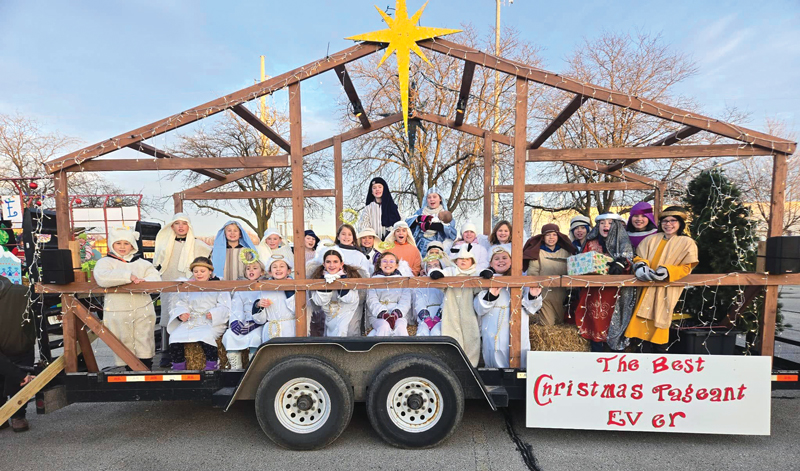 christmas parade float with nativity children star
