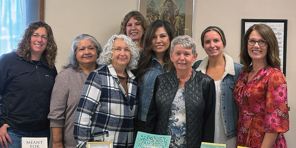 Soul Sisters book club. a group of women standing for photo