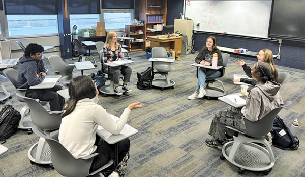 teen led bible study sitting in circle