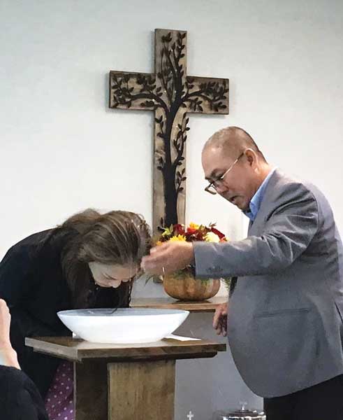 baptism of grown woman asian pastor