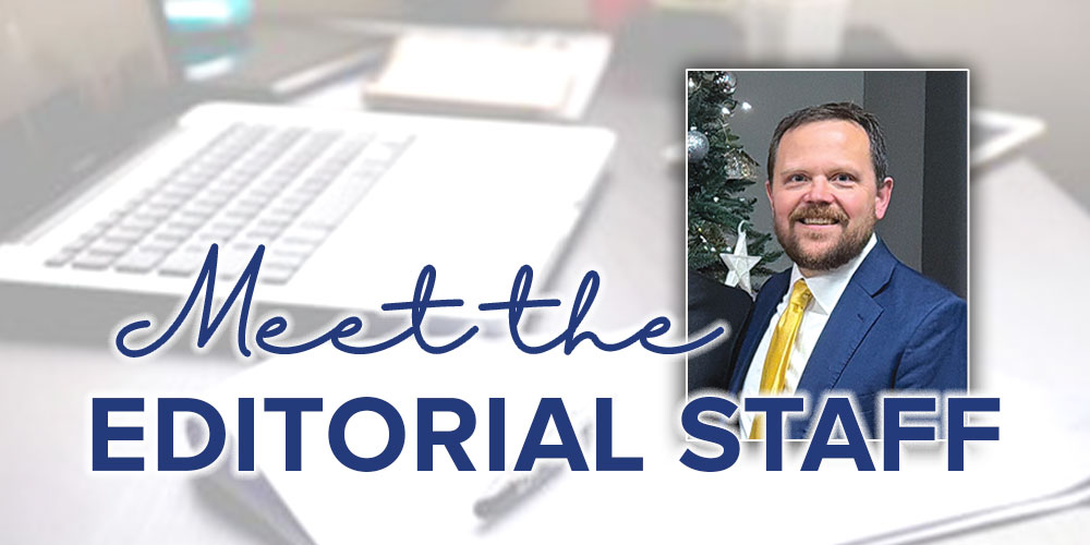 Meet editorial Michael Seifert blue suit yellow tie