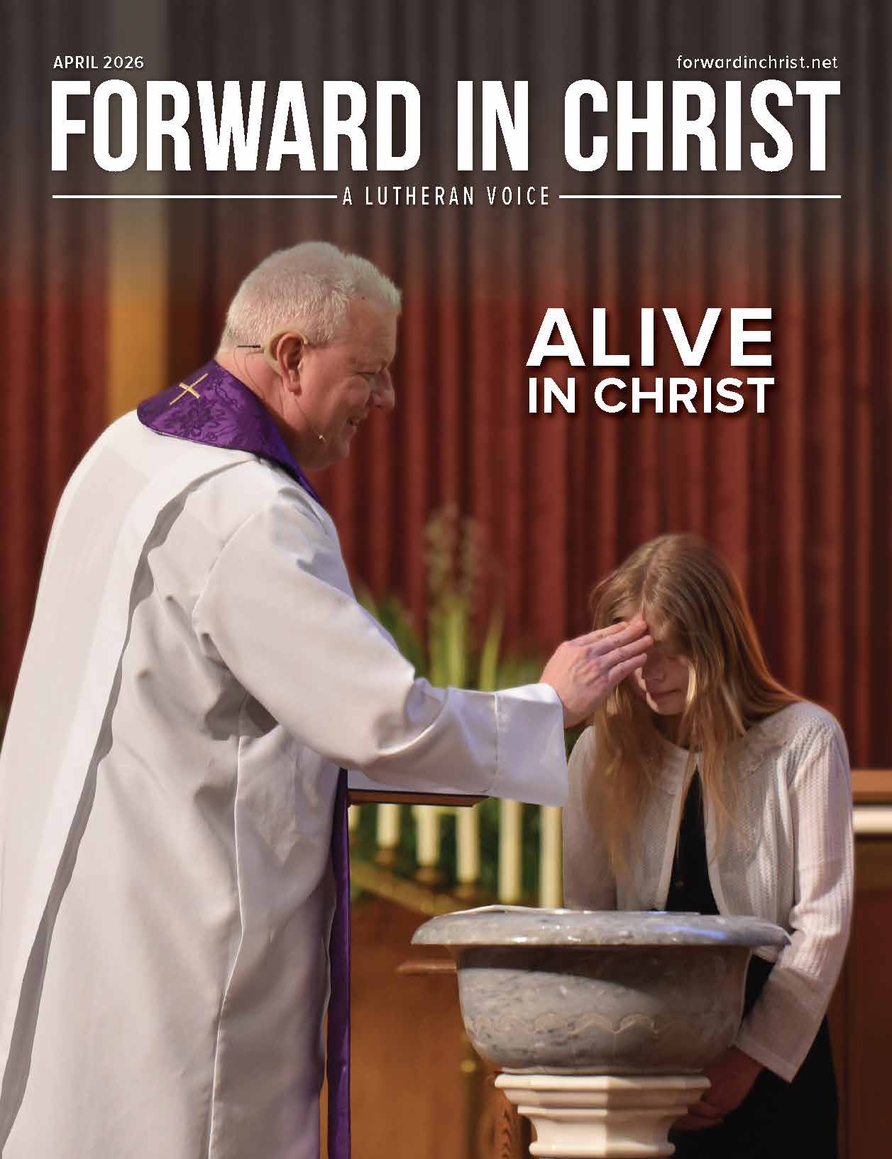 Pastor baptizing a young girl at the baptismal fountain