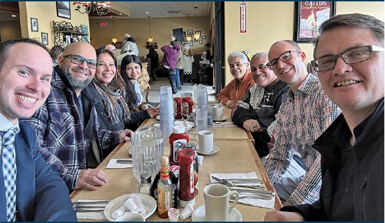 Academia Cristo members at diner having coffee