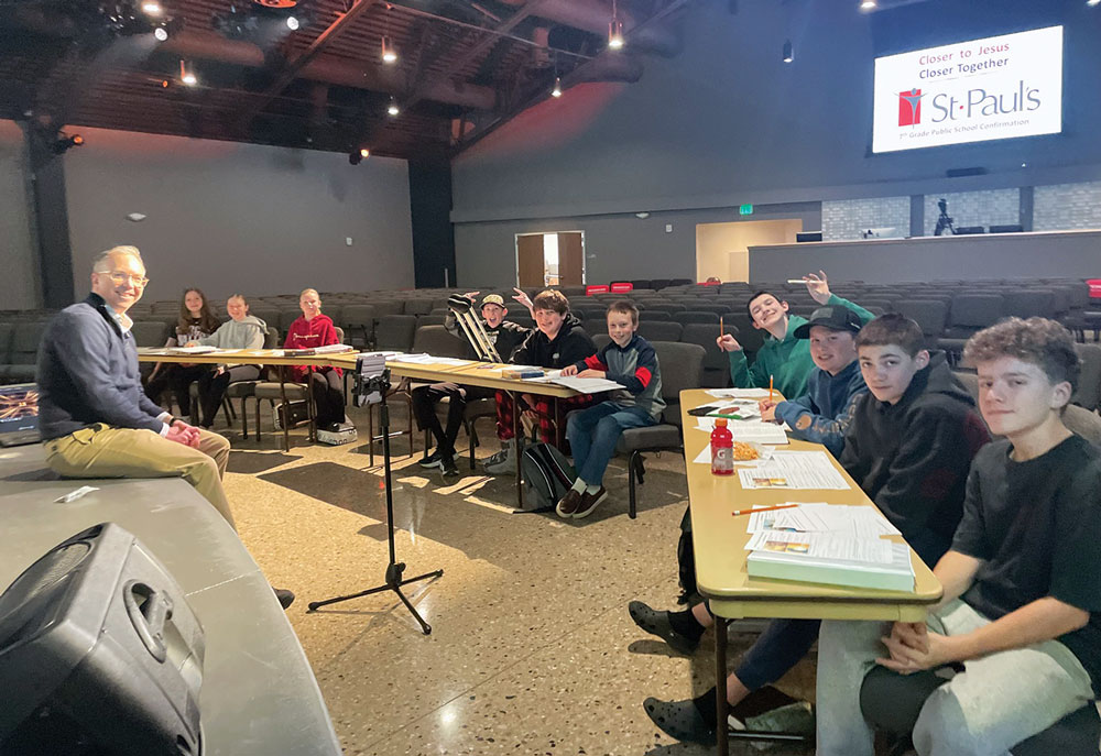 Seventh-grade confirmation students and leader