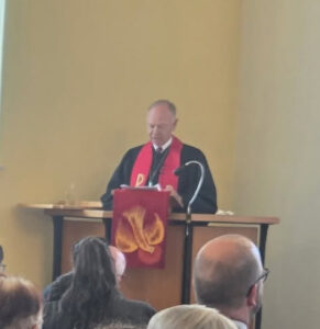 WELS President Mark Schroeder preaching at the 150th anniversary of the Evangelical Lutheran Free Church in Germany