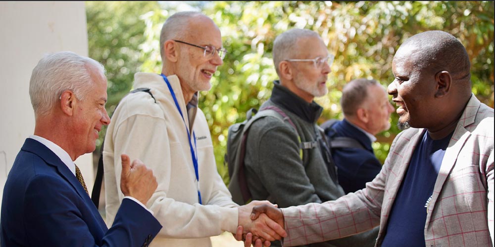 men shaking hands at CELC