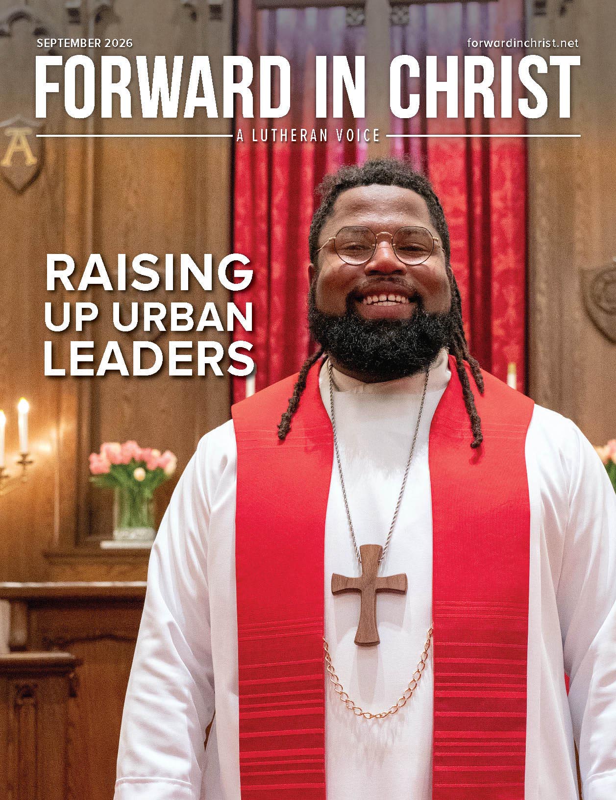 September cover photo of Pastor Keri Jackson in white robe and red stole