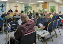 palm sunday service holding palms