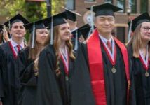MLC graduates in line ready to walk in