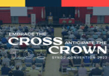 cross and crown logo and overview of the convention attendees
