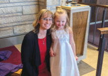 June Keller teacher and student Aurora at Aurora’s baptism.