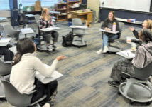 teen led bible study sitting in circle